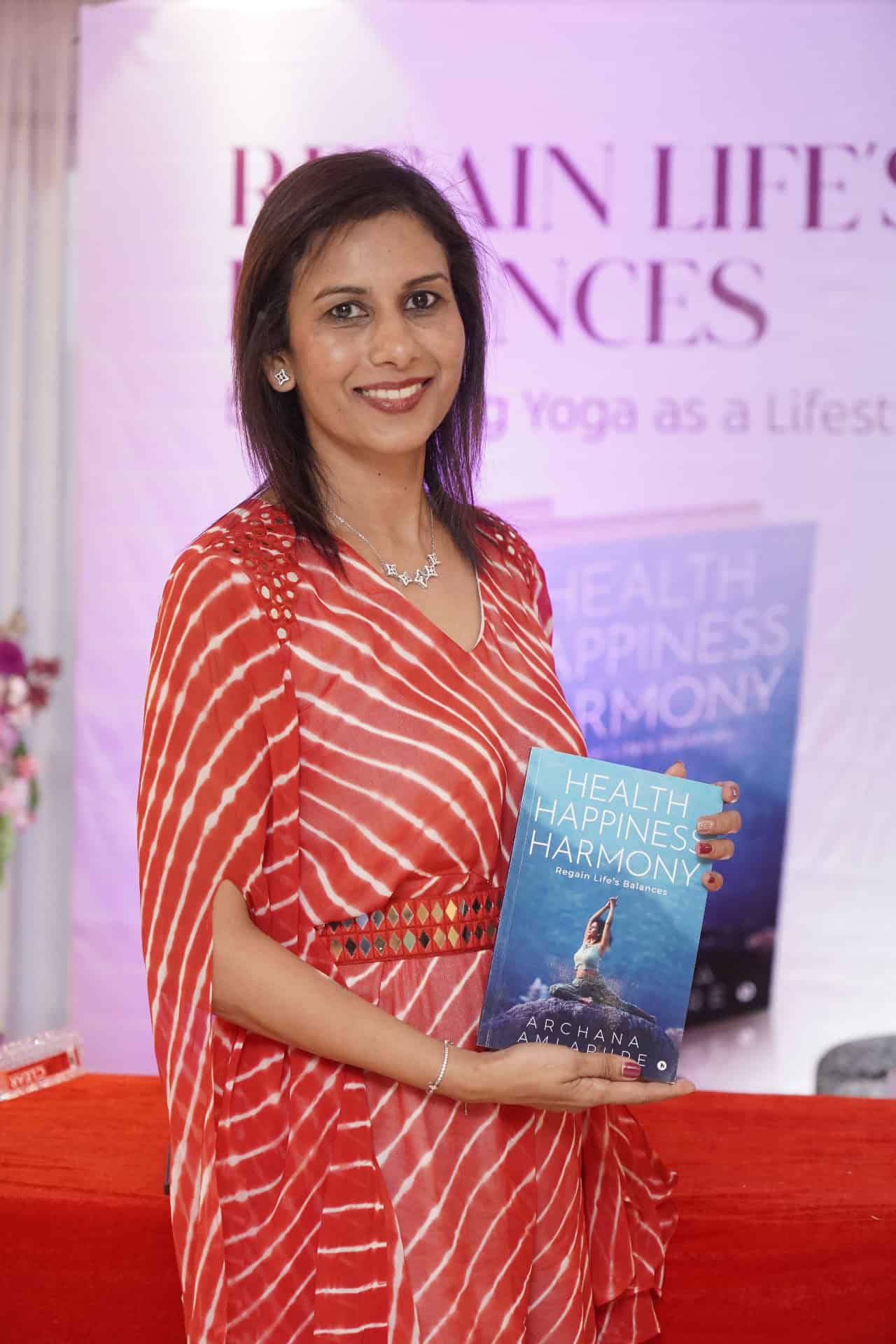 Archana with her book